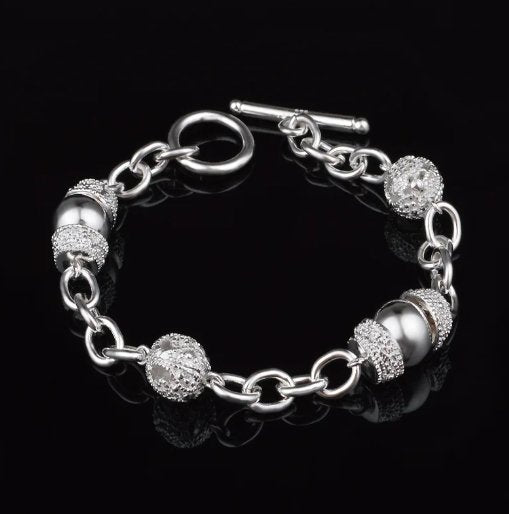 Elegant Silver Charm Hollow Ball Bracelet