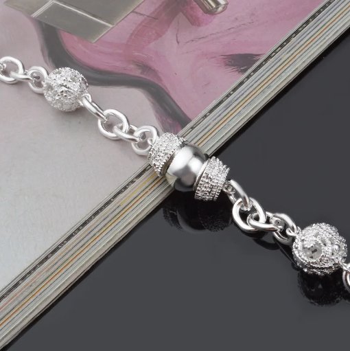Elegant Silver Charm Hollow Ball Bracelet